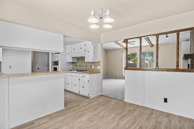 1121 S 221st W Ave, Sand Springs, OK 74063 - kitchen with white appliances, light wood-type flooring, white cabinets, and a chandelier