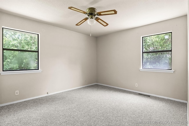 1121 S 221st W Ave, Sand Springs, OK 74063 - spare room featuring ceiling fan and carpet floors