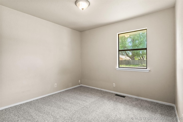 1121 S 221st W Ave, Sand Springs, OK 74063 - spare room featuring carpet and baseboards