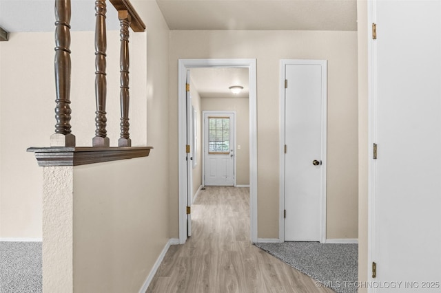 1121 S 221st W Ave, Sand Springs, OK 74063 - hallway featuring wood finished floors and baseboards