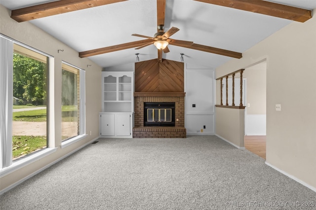 1121 S 221st W Ave, Sand Springs, OK 74063 - unfurnished living room with carpet, ceiling fan, and a brick fireplace