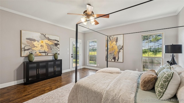9198 E 120th St S, Bixby, OK 74008 - bedroom featuring wood finished floors, multiple windows, ornamental molding, and ceiling fan