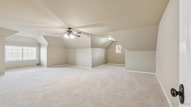 9198 E 120th St S, Bixby, OK 74008 - bonus room featuring ceiling fan, light colored carpet, lofted ceiling, and plenty of natural light