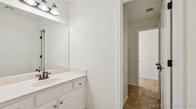 9198 E 120th St S, Bixby, OK 74008 - bathroom with vanity and tile patterned floors