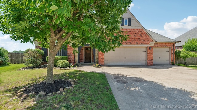 9198 E 120th St S, Bixby, OK 74008 - view of front of house featuring brick siding, driveway, and an attached garage