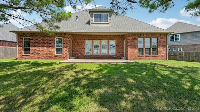 9198 E 120th St S, Bixby, OK 74008 - rear view of house featuring brick siding, a fenced backyard, roof with shingles, and a patio area