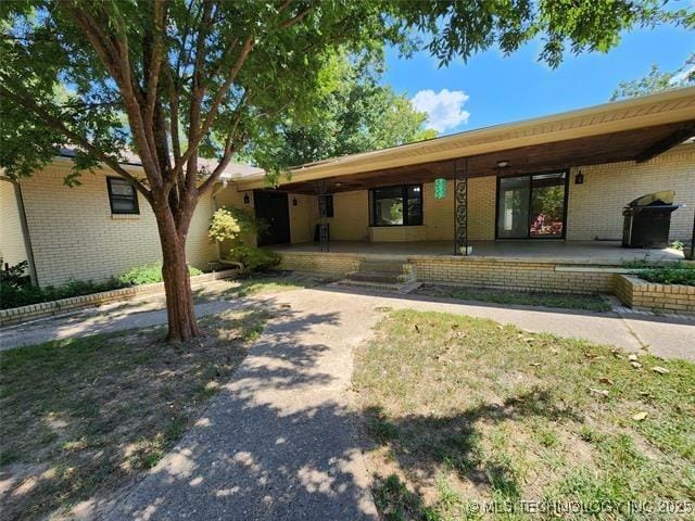 10 W Midland, Shawnee, OK 74804 - exterior space featuring brick siding