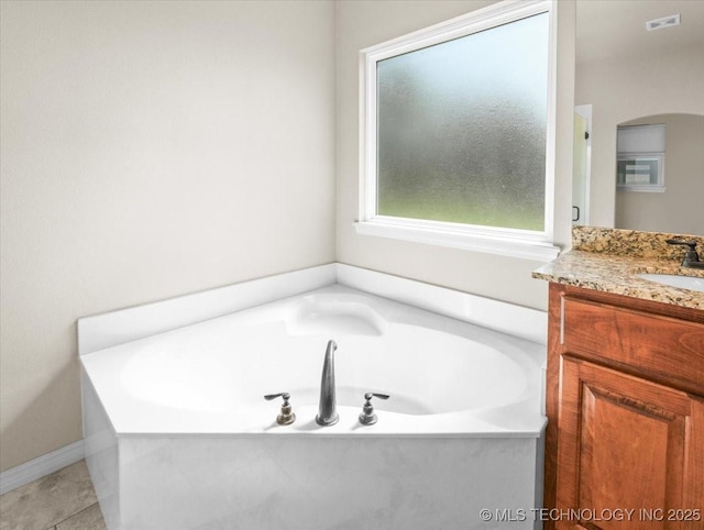 23609 E 135th St, Coweta, OK 74429 - full bath with vanity and a garden tub