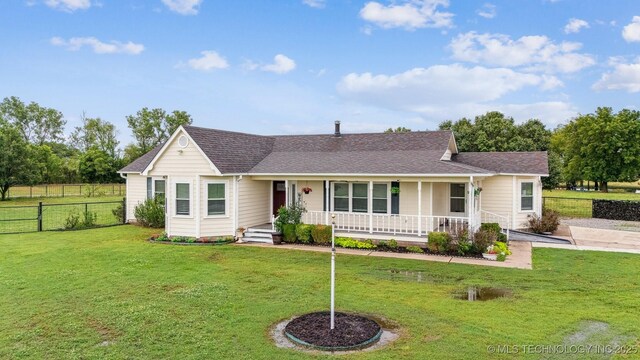12929 N Sheridan Rd, Collinsville, OK 74021 - view of front of property featuring covered porch and roof with shingles