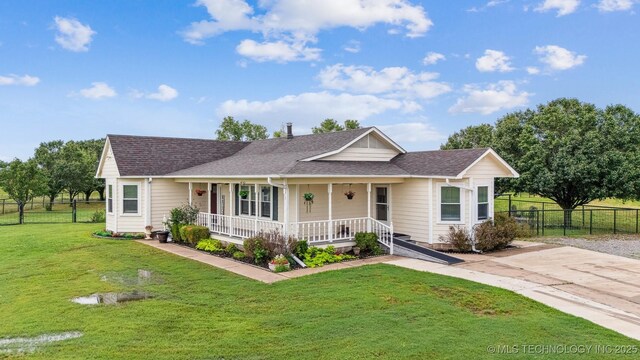 12929 N Sheridan Rd, Collinsville, OK 74021 - farmhouse inspired home featuring a porch and roof with shingles