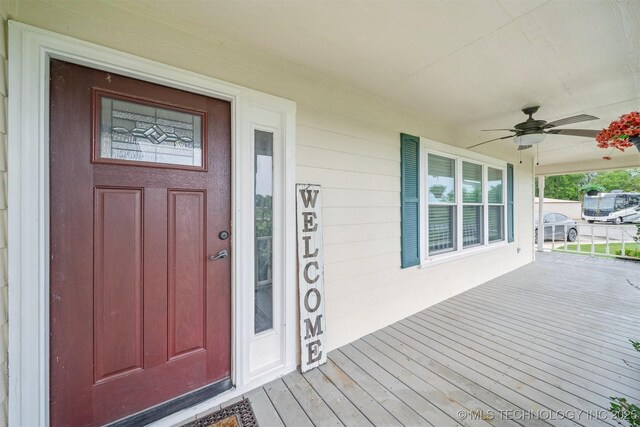 12929 N Sheridan Rd, Collinsville, OK 74021 - doorway to property featuring a porch and a ceiling fan