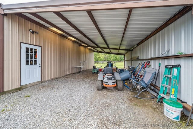 12929 N Sheridan Rd, Collinsville, OK 74021 - garage with a carport