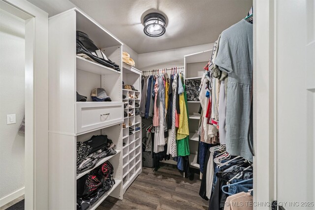 12929 N Sheridan Rd, Collinsville, OK 74021 - walk in closet featuring wood finished floors