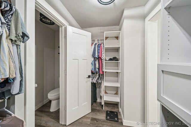 12929 N Sheridan Rd, Collinsville, OK 74021 - walk in closet featuring wood finished floors