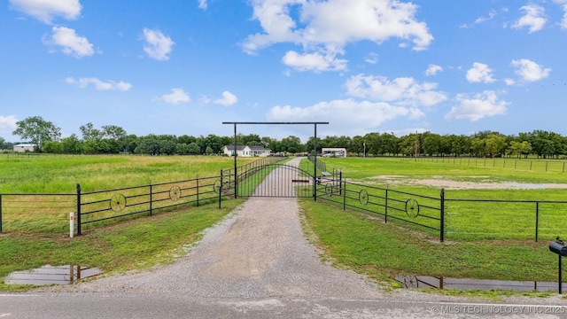 12929 N Sheridan Rd, Collinsville, OK 74021 - view of road with a rural view, a gate, and a gated entry