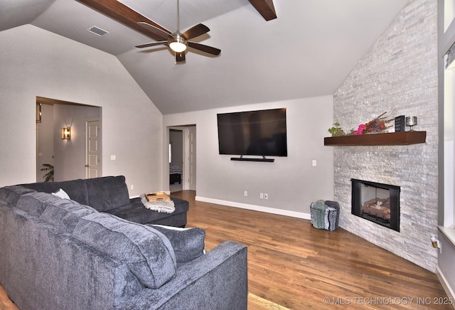 10423 S 233rd E Pl, Broken Arrow, OK 74014 - living room with vaulted ceiling, a ceiling fan, wood finished floors, and a fireplace