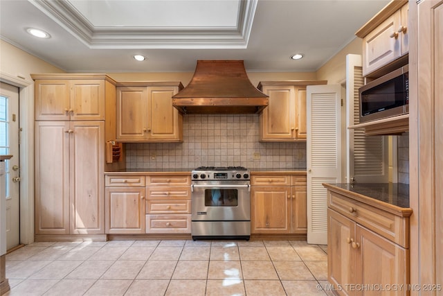 321 E 29th Pl, Tulsa, OK 74114 - kitchen with exhaust hood, appliances with stainless steel finishes, crown molding, dark countertops, and decorative backsplash