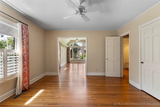321 E 29th Pl, Tulsa, OK 74114 - empty room featuring a ceiling fan, wood finished floors, and ornamental molding