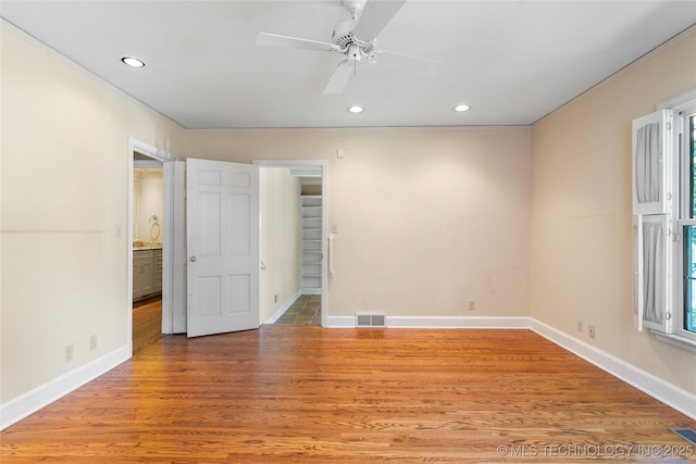 321 E 29th Pl, Tulsa, OK 74114 - unfurnished bedroom with recessed lighting, crown molding, light wood-type flooring, and a ceiling fan