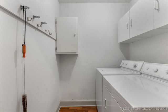 321 E 29th Pl, Tulsa, OK 74114 - laundry area featuring cabinet space, washer and clothes dryer, and dark wood-style flooring