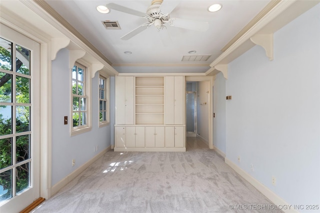 321 E 29th Pl, Tulsa, OK 74114 - empty room with carpet, ceiling fan, crown molding, and built in shelves