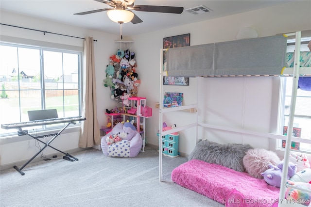 13661 S 23rd St, Bixby, OK 74008 - carpeted bedroom featuring multiple windows and a ceiling fan