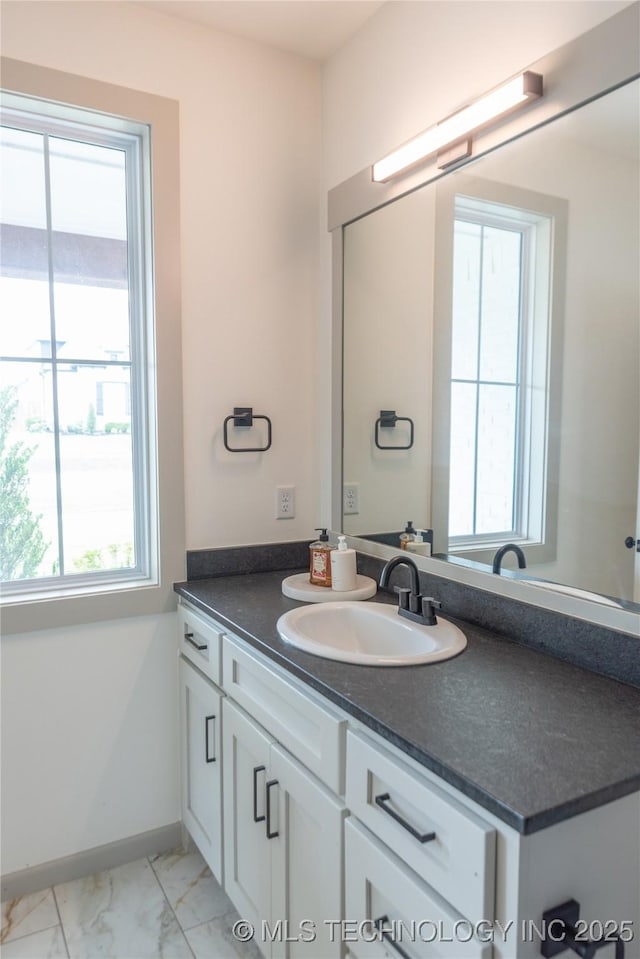 13661 S 23rd St, Bixby, OK 74008 - bathroom with vanity and marble look tiles