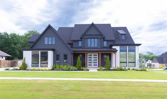 13661 S 23rd St, Bixby, OK 74008 - view of front of property with a standing seam roof, stucco siding, and roof with shingles