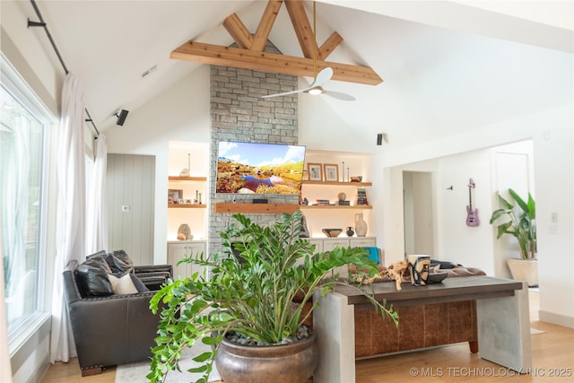 13661 S 23rd St, Bixby, OK 74008 - living room featuring high vaulted ceiling, a ceiling fan, beamed ceiling, wood finished floors, and a fireplace