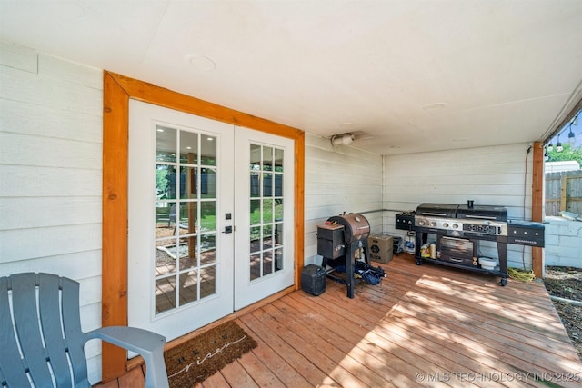 210 NW 4th St, Checotah, OK 74426 - deck featuring french doors and a grill