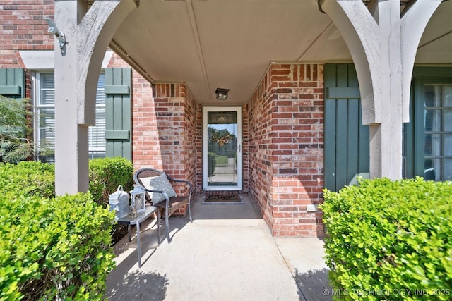 304 S 63rd St, Broken Arrow, OK 74014 - view of exterior entry with brick siding and a patio