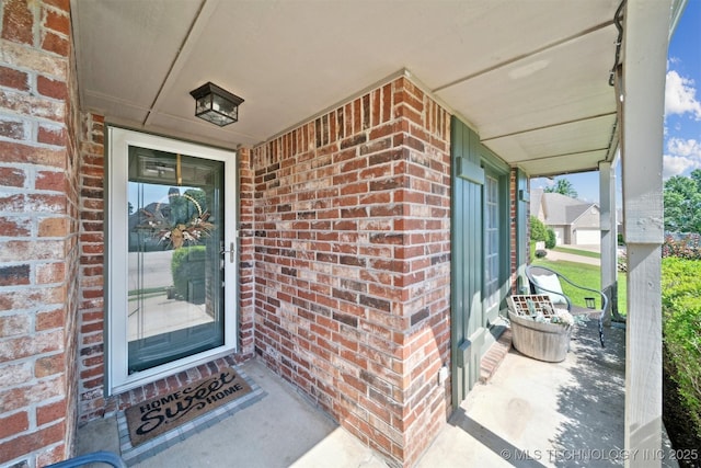 304 S 63rd St, Broken Arrow, OK 74014 - entrance to property with covered porch and brick siding