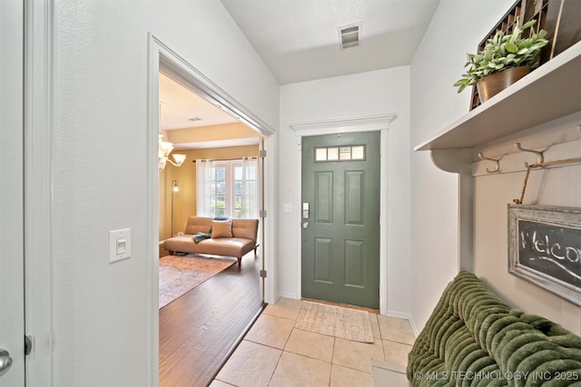 304 S 63rd St, Broken Arrow, OK 74014 - foyer with light tile patterned floors and baseboards