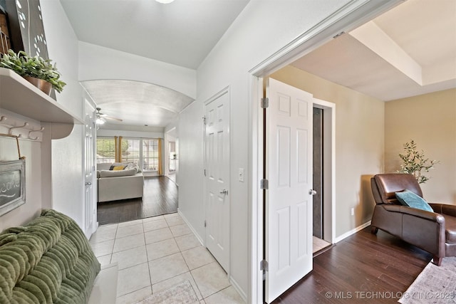 304 S 63rd St, Broken Arrow, OK 74014 - hallway with light wood finished floors and arched walkways