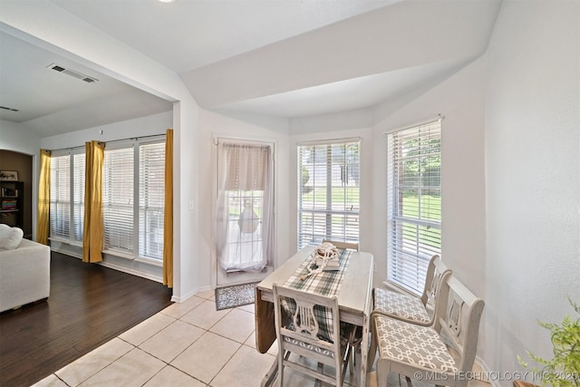 304 S 63rd St, Broken Arrow, OK 74014 - dining area with vaulted ceiling and light tile patterned floors