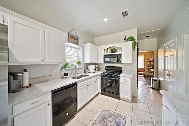 304 S 63rd St, Broken Arrow, OK 74014 - kitchen with black appliances, white cabinets, open shelves, and recessed lighting