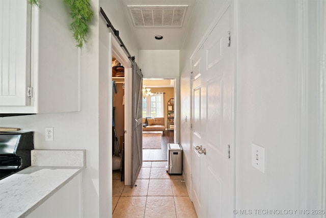 304 S 63rd St, Broken Arrow, OK 74014 - hall featuring a barn door