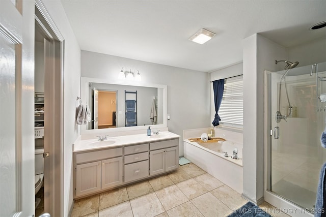 304 S 63rd St, Broken Arrow, OK 74014 - bathroom with a garden tub, a stall shower, double vanity, and tile patterned floors