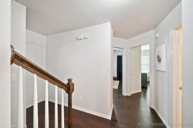 304 S 63rd St, Broken Arrow, OK 74014 - hallway featuring wood finished floors and baseboards