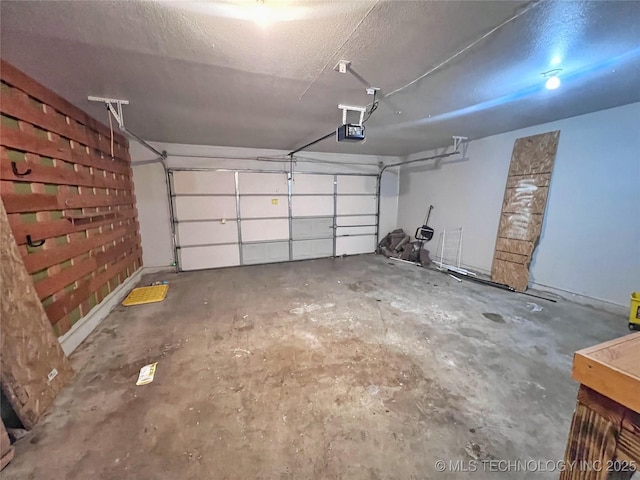 3610 Magnolia Dr, Sand Springs, OK 74063 - garage featuring a garage door opener