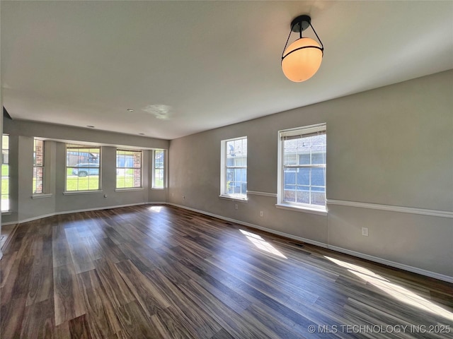 3610 Magnolia Dr, Sand Springs, OK 74063 - unfurnished room with dark wood-type flooring