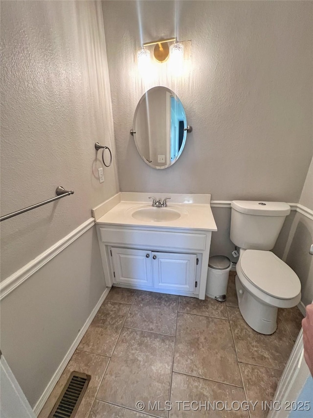 3610 Magnolia Dr, Sand Springs, OK 74063 - half bathroom with vanity and tile patterned flooring