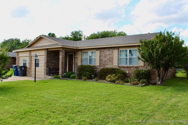 12329 E 18th St, Tulsa, OK 74128 - ranch-style house with a front yard, a garage, brick siding, and concrete driveway