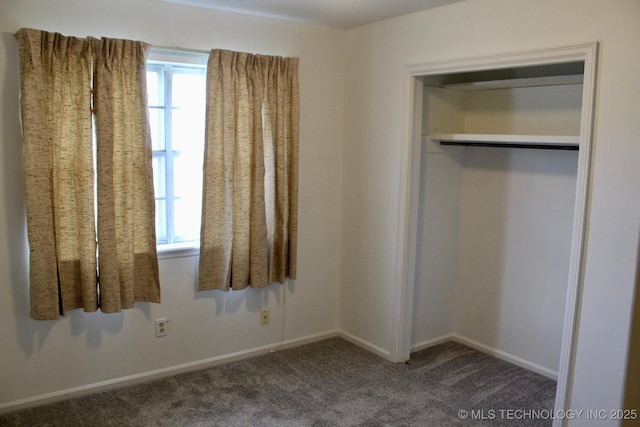 12329 E 18th St, Tulsa, OK 74128 - unfurnished bedroom featuring carpet and baseboards