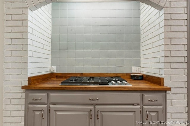 8766 Haskell Dr, Broken Arrow, OK 74014 - kitchen with wooden counters and stainless steel gas stovetop