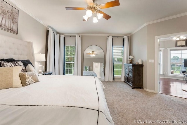 8766 Haskell Dr, Broken Arrow, OK 74014 - bedroom with carpet, crown molding, multiple windows, and a ceiling fan