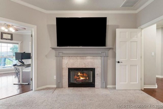 8766 Haskell Dr, Broken Arrow, OK 74014 - detailed view of crown molding, carpet, a fireplace, and ceiling fan