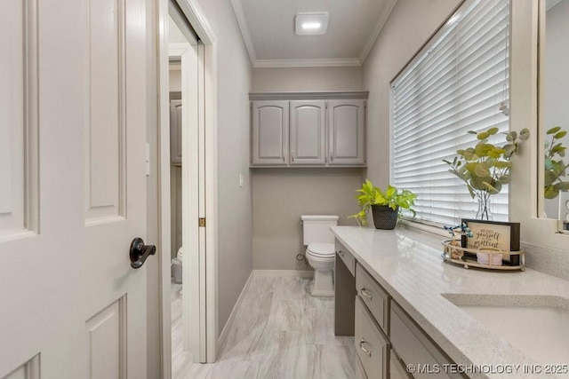 8766 Haskell Dr, Broken Arrow, OK 74014 - bathroom with marble finish flooring, crown molding, and vanity