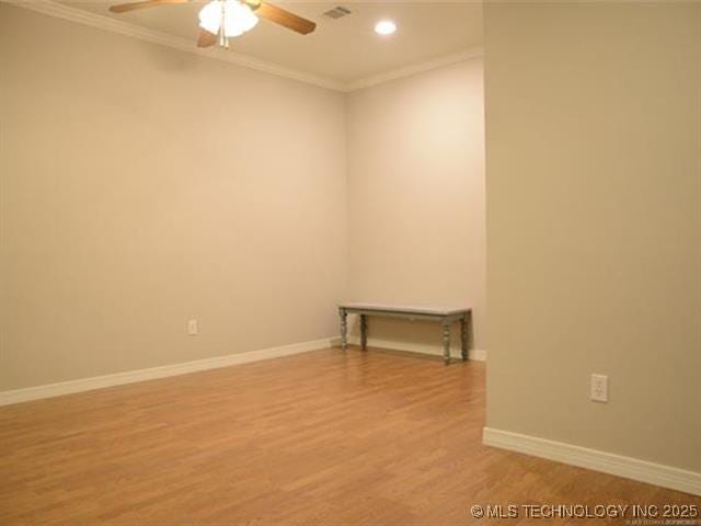 8766 Haskell Dr, Broken Arrow, OK 74014 - spare room with light wood-style flooring, a ceiling fan, ornamental molding, and recessed lighting