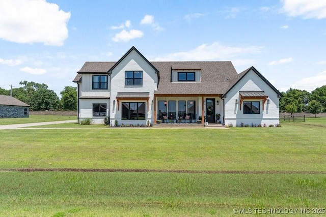 21933 E 101st Pl S, Broken Arrow, OK 74014 - back of property with a lawn, board and batten siding, and roof with shingles